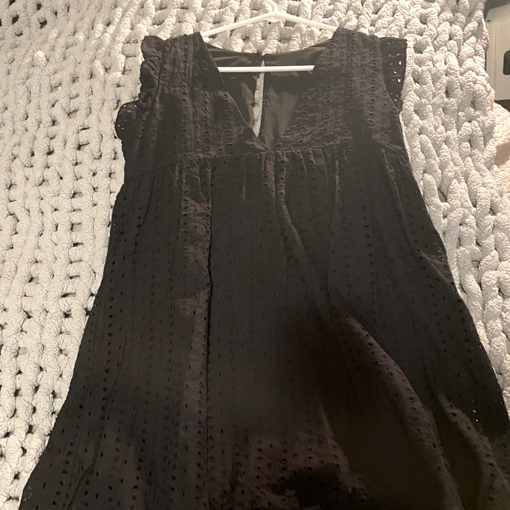 Eyelet black dress with pockets and built in shorts